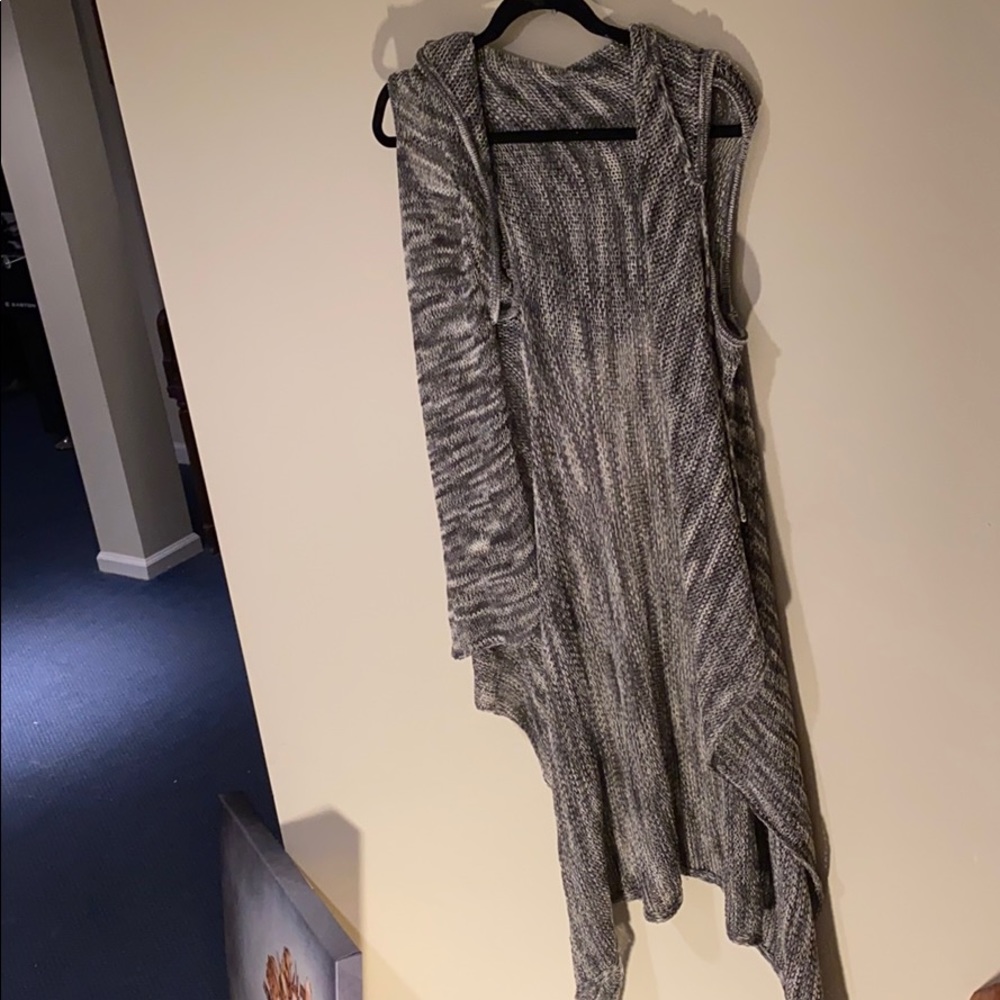 Long sleeveless sweater